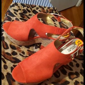 Orange wedge heels